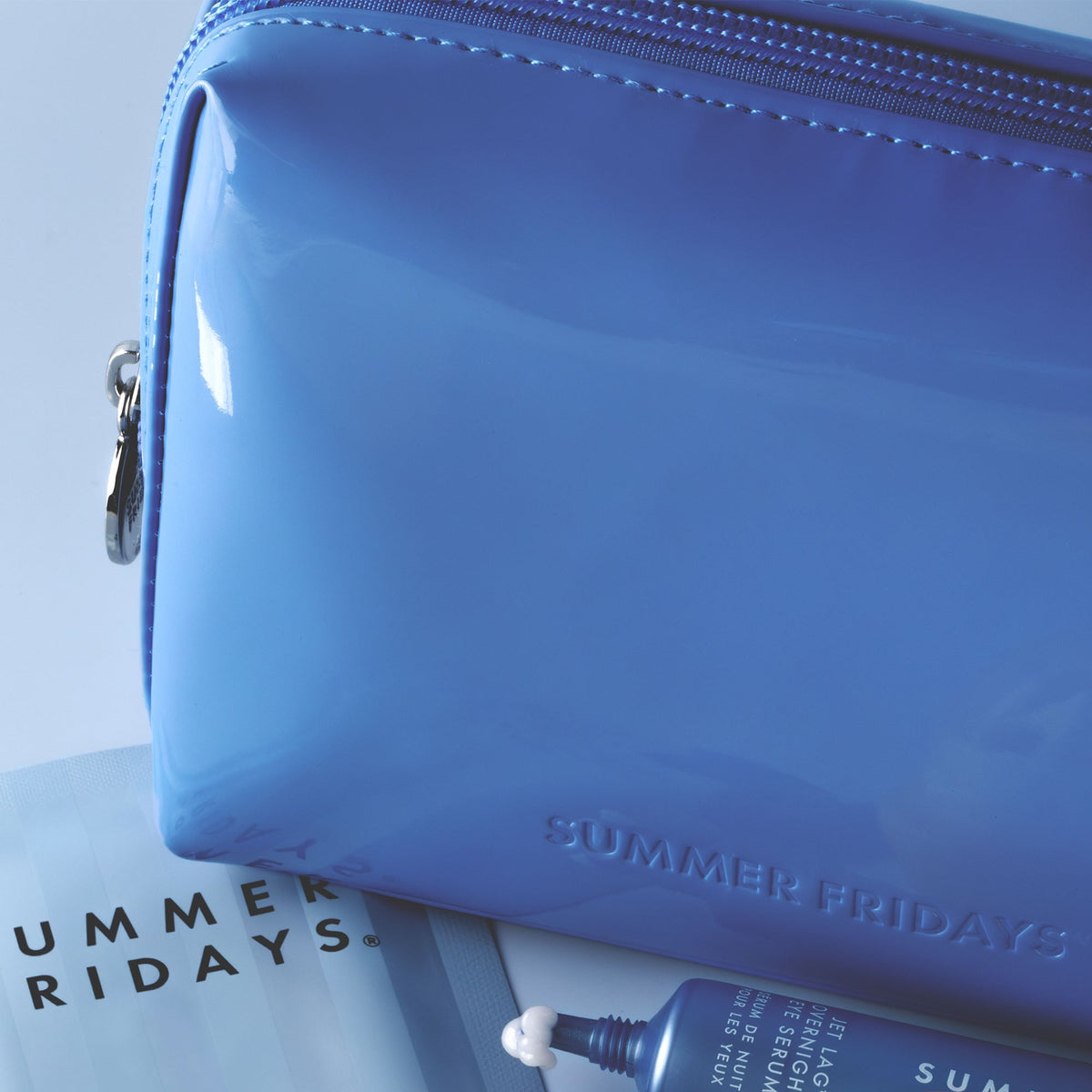 glossy-pouch-in-jet-lag-blue-u6 Glossy-Pouch-Jet-Lag.jpg